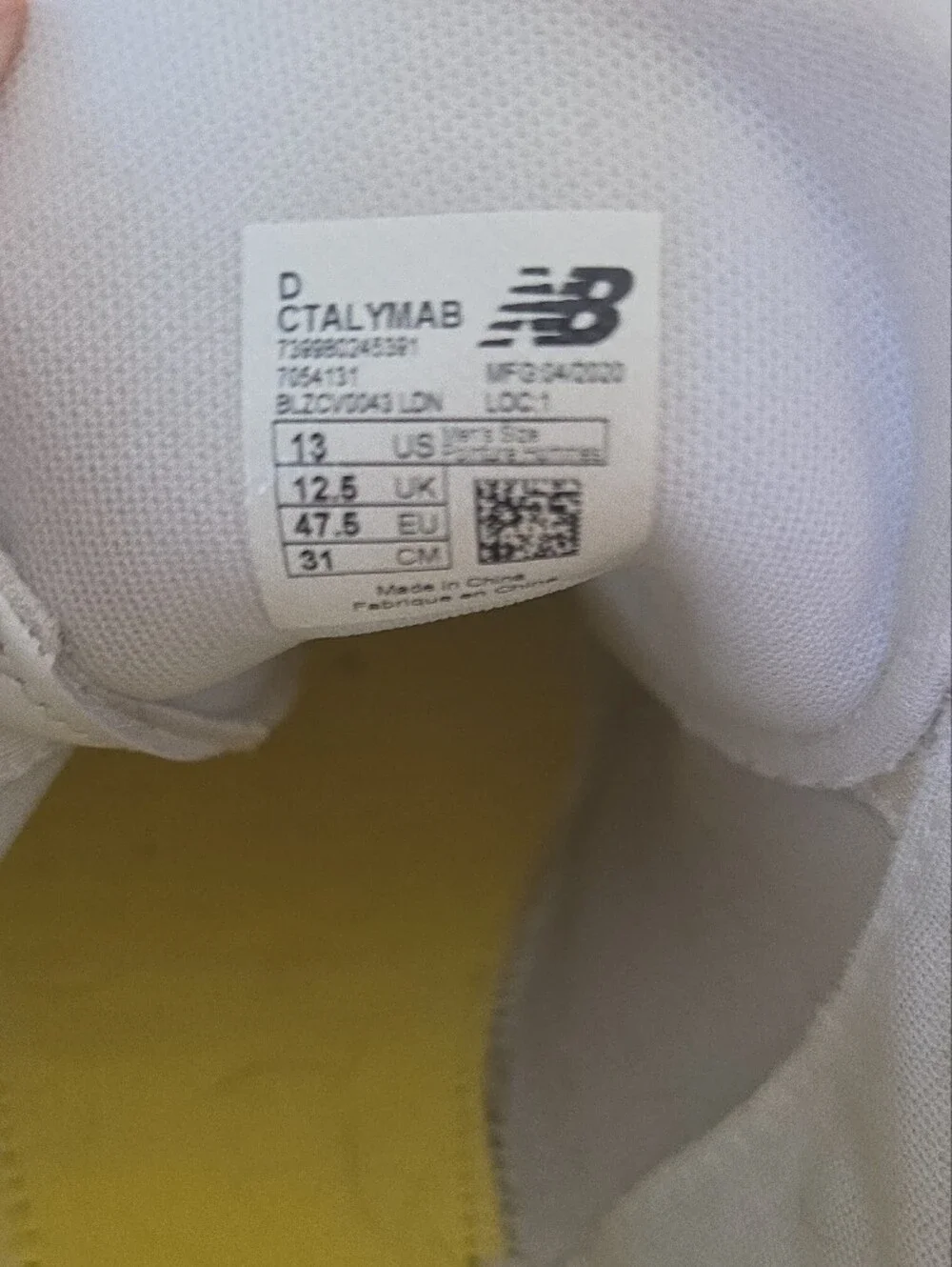 New Balance White Sneakers with Green Heel Accent